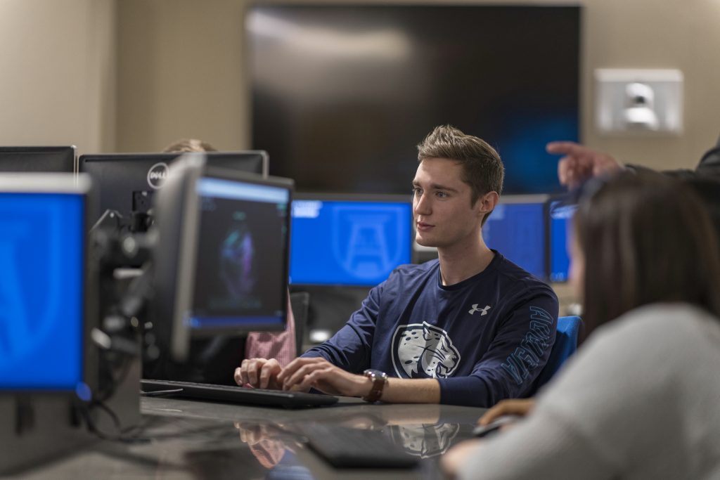 Student working on cyber activity in class. 