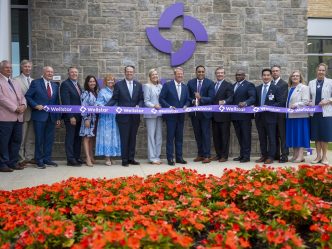 Group shot of the ribbon cutting