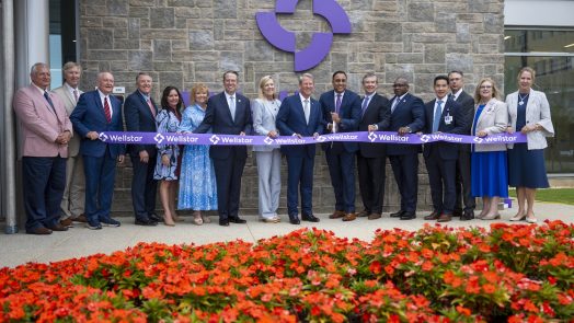 Group shot of the ribbon cutting