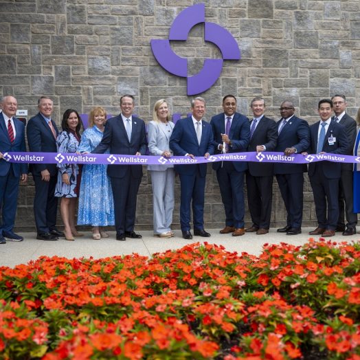 Group shot of the ribbon cutting