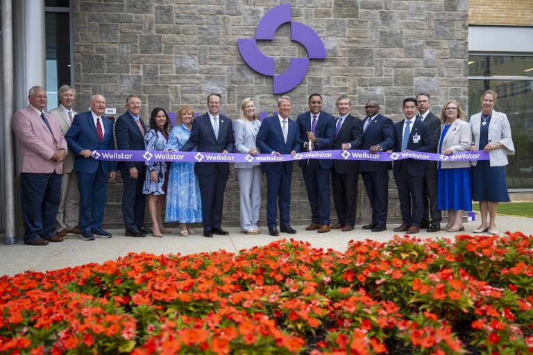 Group shot of the ribbon cutting