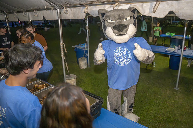 AU mascot, Augustus, in Brew-N-Que T-shirt