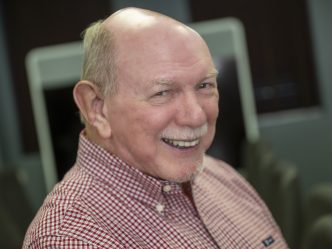 man with a prosthetic ear