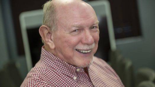man with a prosthetic ear