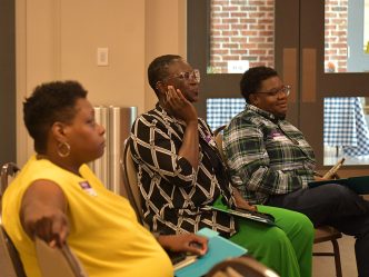 Participants listen and engage during the Connected for Life Open-House event. [Aaron Smith/Augusta University]