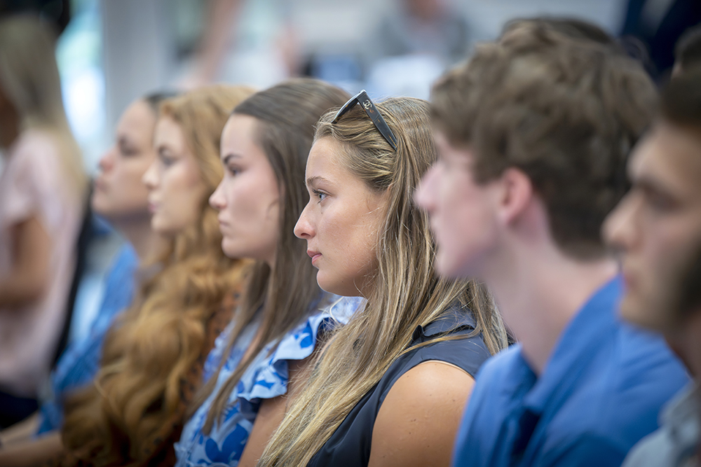 Students listen to speaker